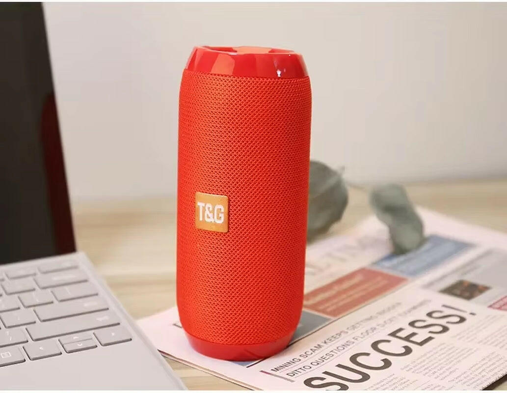 Waterproof Portable Bluetooth Speaker with Subwoofer, AUX, and FM Radio Functionality.