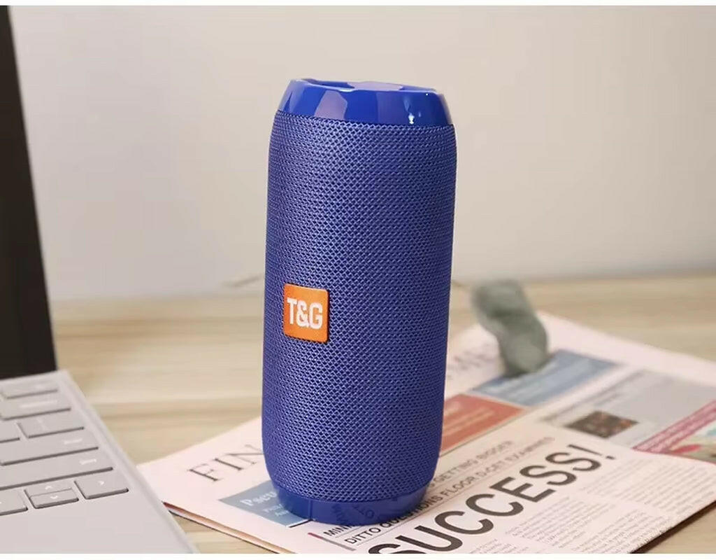 Waterproof Portable Bluetooth Speaker with Subwoofer, AUX, and FM Radio Functionality.